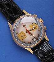 ROXY ARMBANDCHRONOGRAPH, SCHWEIZ UM 1965, GG 750/000, BODEN U. GLASR. GEDR., BLATT FARBL. DIFF., 45-MIN.-STOPPZÄHLER, DATUM BEI 6, ...