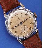 UROFA HERRENARMBANDUHR, ERSTE NACHKRIEGS- KONSTR. KAL. 61, IN GER. STüCKZAHL GEFERT., UM 1946, METALL VERCHR., BER., EDELST.-BODEN U. GLASR. ...