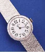 TISSOT DAMENGOLDBANDUHR, SCHWEIZ FüR DEN DTSCH. MARKT UM 1985, WG 585/000 RHOD. INCL. MILANAISEBAND, BODEN GEDR., EMAILFARB. KON- ...