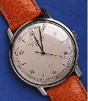 MOVADOMOVADO HERRENARMBANDUHR TEMPOMATIC SPORT, EDELST., BODEN U. GLASR. GEDR., SOGEN. HAMMER- AUTOMATIK, 17 ST., KAL. 220M, SCHWEIZ UM 1948, WERK ...