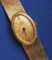 JUNGHJUNGHANS DAMENGOLDBANDUHR, DEUTSCHLAND UM 1970, GG 585/000 INCL. GG-FLECHTB., BODEN GE- DR., FORMANKERW., KAL. 672, 17 ST., HANDAUFZUG ...