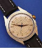 BULOVA HERRENARMBANDUHR, SCHWEIZ/USA UM 1954, METALL GG-AUFL., NUTZSP. üBERARB., VERS. BLATT, NAGELMUSTERDESIGN, 17 ST., RUND- ANKERW., ...