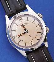 BENRUSBENRUS ARMBANDWECKER WRISTALARM, SCHWEIZ/ USA UM 1959, EDELST., BODEN GESCHR., AUßER LEDERB. ORIG.-ZUST., 17 ST., HANDAUFZUG, MO- DELL ...