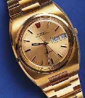 OMEGA OMEGA HERRENARMBANDUHR MEGAQUARTZ GENEVE (32 KHZ), SCHWEIZ 1974, PLAQUE D'OR GEH. (20 MICRON AUFL.), BODEN GESCHR., ZENTRAL- SEK., TAG ...