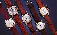 WITTNAUWITTNAUER HERRENARMBANDUHR SEHR SELTEN, SCHWEIZ/USA UM 1948, GG 750/000, RUNDGEH., EXTREM BET. BANDANST., BLATT PERF. REST., AUF- GES. ...