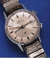 BULOVA BULOVA ARMBANDWECKER WRISTALARM, SCHWEIZ UM 1965, EDELST., BODEN GESCHR., ZUGGLIEDERB. SPÄTER, BEI FERTIGST. WASSERGESCH., WERK VER- G., ...