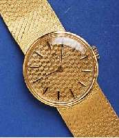 MOVADO MOVADO DAMENGOLDBANDUHR, SCHWEIZ UM 1970, GG 750/000-GEH. INCL. GG-FLECHTB., DESIGN VON BAND IN GOLDZIFFERBL. ÜBERGEHEND, AUFGES. ...