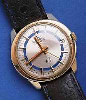 JAEGER LJAEGER LE COULTRE HERRENARMBANDUHR, GG-FIL- LED, EINSCHALENGEH., AB HERST. WASSERGESCH., DAT.-SCHNELLKOR. DURCH DRÜCKER. KRONE, AUTO- ...