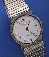 BAUME BAUME & MERCIER ARMBANDUHR MEDIUM QUARTZ, SCHWEIZ UM 1990, EDELST., FLACHE AUSF., EDEL- ST.-BAND, ZWISCHENGL. HARTVERG., SAPHIRFLACH- GL., ...