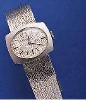 DUGENA DAMENGOLDBANDUHR, WG 585/000-GEH. INCL. WG-BAND RHOD., DEUTSCHLAND/SCHWEIZ UM 1970, BODEN GEDR., RUNDANKERW., 17 ST., HAND- AUFZUGKAL. ETA ...