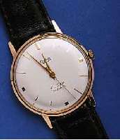 RIKA RIKA HERRENGOLDUHR, SCHWEIZ UM 1958, ROSE- G. 750/000, BODEN GEDR., RUNDANKERW., 21 ST., HANDAUFZUG, BASISKAL. ETA 2390, STREIFEN- SCHL., ...