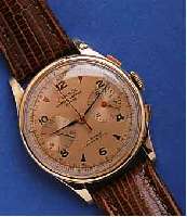 CARROL ARMBANDCHRONOGRAPH, SCHWEIZ UM 1948, RG 750/000, BODEN U. GLASR. GEDR., METALLCUV. ZUR ARMIERUNG, KUPFERFARB. BLATT, 30-MIN.- STOPPZÄHLER, ...