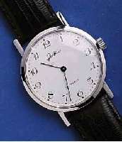 GLASHGLASHÜTTE HERRENARMBANDUHR, DEUTSCHLAND UM 1984, METALL VERCHR., EDELST.-BODEN GEDR., EMAILFARB. KONTRASTZIFFERBL., FORMANKERW., KAL. ...