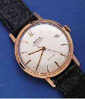 DOXA HERRENARMBANDUHR AUTOMATIK, SCHWEIZ UM 1959, RG 585/000, BODEN VERSCHR., BANDANST. L. VERZ., 21 ST., ZENTRALROTOR, SCHR.-UNR., FLACHSPIR., ...