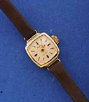 GLASHÜTTE DAMENGOLDUHR, DEUTSCHLAND UM 1969, GG 585/000, BOD. AUFGEDR., 17 ST., FORMANKERW. ,KAL. 08-20, HANDAUFZ., EIGENE STOßSICHERUNG, ...