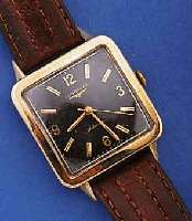 LONGINES HERRENARMBANDUHR, SCHWEIZ/USA UM 1952, GG-FILLED, CARREE-ARRONDE-FORM, BER., BOD. AUFGEDR., FRÜHE AUTOMATIK M. ZENTRALSEK., KAL. 19AS, ...