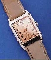 KONVOLUT: 3X ORLYS HERRENARMBANDUHREN, FÜR D. DEUTSCH. MARKT, 1948-1954, UNGETR. LAGERW., LT. LAGERSP., ALLES RECT.-FORM, KONKAVGL., 2X ...