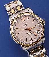 TISSOT HERRENARMBANDUHR BALLADE, AUTOMATIK, BICOLOR, EDELST., TEILW. POL., TEILW. SAT., LÜN., KRONE M. SEITENSCHUTZ, SOWIE ZWISCHENGL. D. EDELST. ...