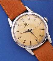 OMEGA HERRENARMBANDUHR, SCHWEIZ UM 1961, EDELST., BOD. U. GLASRAND AUFGEDR., D. CA. 35 MM, AUßER LEDERBD. ORIG.ZUSTAND, BL. ALTERS- BED. FARBLICH ...