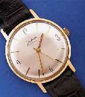 GLASHÜTTE HERRENARMBANDUHR, DEUTSCHLAND UM 1965, METALL, ROSE HART VERG., EDELST.BOD. AUFGED., LEDERBD. NEU, 17 ST., HANDAUFZ., KAL. 70,1, ...
