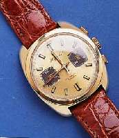 PLYMOUTH ARMBANDCHRONOGRAPH, SCHWEIZ UM 1970 , GG 750/000, BOD. U. GLASRD. AUFGEDR., WID- MUNGSGRAV.AUF BOD.V.1979, 45 MIN. STOPPZÄHL., TACHYMET.- ...