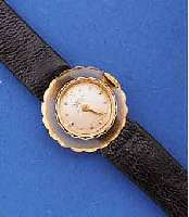UNIVERSAL GENEVE DAMENGOLDUHR, AUFWENDIGES GG 750/000-GEH., BOD. AUFGEDR., LÜN. NACH OBEN GESCHW., TEILVERDECKTE BANDANST., ORIG. GL. ...