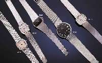 UNIVERSAL GENEVE DAMENGOLDBANDUHR, SCHWEIZ, UNGETR. LAGERWARE UM 1970, WG 750/000-GEH. INCL. WG-FLECHTBD. RHOD., BD. AUFGEDR., KON- ...