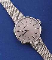 LANCO/TISSOT DAMENGOLDBANDUHR, SCHWEIZ UM 1970, UNGETR. LAGERW., WG 333/000-GEH. INCL. WG-FLECHTB. RHOD., BODEN GEDR., FORMANKERW., TISSOT-KAL. ...