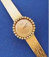 SARCAR DAMENGOLDBANDUHR, SCHWEIZ UM 1972, GG 585/000 INCL. GG-FLECHTBAND, AUFWEND. LÜNETTE GEPERLT, BODEN GEDR., UNGETR. LAGERW., RUNDANKERW. VON ...