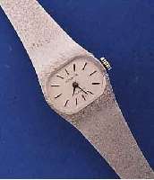 DUGENA DAMENGOLDBANDUHR SERIE CLASSIC, DEUTSCHLAND/SCHWEIZ UM 1970, WG 585/000 INCL. WG-MILANAISEBAND, BODEN GEDR., UNGETR. LAGERW. ...
