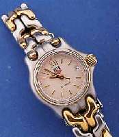 HEUER/TAG DAMENARMBANDUHR, SCHWEIZ UM 1995, EDELST. MATT. INCL. EDELST.-BAND, ZWISCHENGL. WIE SCHR.-KRONE U. LÜNETTE HARTVERG., SICHER- ...