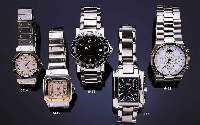 CARTIER HERRENARMBANDUHR SANTOS, EDELST. INCL. EDELST.-BAND, BODEN U. GG-LÜNETTE 8-FACH VERSCHR., BEI FERTIGST. WASSERD., 2-FACH RAST. SAPHIRKRONE ...