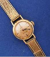 OMEGA DAMENGOLDBANDUHR LADYMATIC, SCHWEIZ UM 1961, GG 750/000 INCL. NEUTR. GG 585/000- GLIEDERB., BODEN GEDR., BLATT VERS., ALTERS- BED. FARBL. ...
