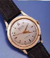 PONTIAC HERRENARMBANDUHR, SCHWEIZ UM 1956, RG 750/000, BOD. U. GLASRD. AUFGEDR., VERS. ORIG. BL., ALTERSBED. LT. FLECKIG, RUNDANKER- WERK, ETA ...