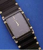LASSALE ARMBANDUHR, JAPAN UM 1985, EDELST. SCHWARZ MATT., ZWISCHENGLIEDER SOWIE TEILE DER L?N. HART VERG., MINERALFLACHGL., BOD. AUFGE- DR., ...