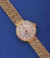OMEGA DAMENGOLDBANDUHR, SCHWEIZ UM 1967, GG 750/000-RUNDGEH. INCL. SPÄTER ANGES. NEUTR. GG 585/000-FLECHTB., BODEN GEDR., VERS. BLATT, RUNDANKERW. ...
