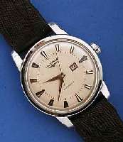 LONGINES HERRENARMBANDUHR AUTOMATIK, SCHWEIZ UM 1957, EDELST., BODEN GESCHR., VERS. BLATT, M. AUFGES. WG-STD.-ZEICHEN, WG-ZEIGER, LEDER- B. ...