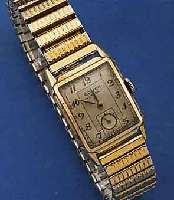 GRUEN VERY THIN HERRENARMBANDUHR, SCHWEIZ/US UM 1952, RECT. GEH. M. GG-AUFL., EDELST.-BOD. GEDR., METALLZUGGLIEDERBD. M. GG-AUFL. ZEIT- IDENT., ...