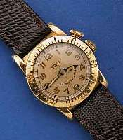 LONGINES ARMBANDUHR WEEMS, SCHWEIZ/USA UM 1940, GG-FILLED, BOD. AUFGEDR., LÜN. M. 60ER- TEILUNG ZUR ZWEITZEIT BEIDS. DREHBAR, ARRET. DURCH ...