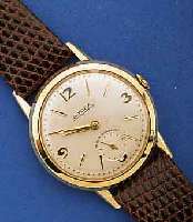 BIFORA GOLDARMBANDUHR, UNTER CHRONOMETERBED. JUSTIERT, MODELL UNIMA, DEUTSCHLAND UM 1960, GG 585/000, BOD. AUFGEDR., KL. SEK. VERTIEFT, 18 ST., ...