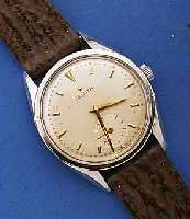 ZENITH HERRENARMBANDUHR, SCHWEIZ UM 1949, EDELST., BOD. GESCHR., BEI FERTIGST. WASSERGE- SCH., AUßER NEUEM LEDERBD. ORIG.ZUSTAND, BL. LEICHT ...