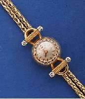 OMEGA DAMENSCHMUCKBANDUHR, SCHWEIZ UM 1958, GG 750/000, 2-REIHIGES KÖNIGSGLIEDERBD., AN D. BANDANST. HERVORGEH. IN WG-GEFASSTE DIAMANTEN , ...