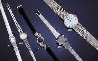 CHOPARD HERRENGOLDBANDUHR, SCHWEIZ UM 1990, FLACHES WG 750/000 GEH. INCL. WG-FLECHTBD., ROD., DESIGN VON BD. IN LÜN. ÜBERGEHEND, SAPHIRFLACHGL., ...