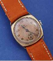 OMEGA HERRENARMBANDUHR, SCHWEIZ UM 1935, NICKEL, CARREE-CAMBREE-GEH., BL. FL., BOD. U. GLASR. AUFGEDR., HANDAUFZ., RUNDANKERW., 15 ST., KAL. 26,5 ...