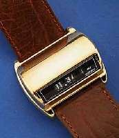JAZ/DERBY/SWISSONIC SELTEN HERRENARMBANDUHR, SCHWEIZ UM 1968, ELEKTROMECHANISCHES WERK M. DIGITALER ANZ. IM SÄULENAUFB., DAZU 2 ORIG.- ...