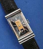 VUILLEMIN REGNIER ART-DECO ARMBANDUHR, SCHW. UM 1938, AUFWENDIGES EDELST.-GEH. M. WALZEN- FÖRMIGEN BEWEGL. BANDANST., 2-FARB. ART-DECO- BL. SIGN., ...