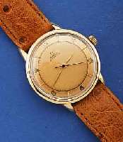 OMEGA HERRENARMBANDUHR, HAMMERAUTOMATIK, SCHWEIZ/USA UM 1950, GG-FILLED, 2-FARB. ORIG.- BL. LT. FLECKIG, WERK ROT VERG., 17 ST., KAL. 28,10, ...