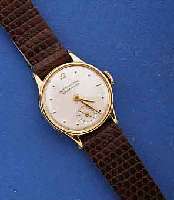 IWC DAMENARMBANDUHR, SCHWEIZ UM 1946, GG 750 /000, BOD. U. GLASRAND AUFGEDR., BL. REST., KL. SEK. TEILVERT., BRÜCKENANKERWERK, 15 ST., ...