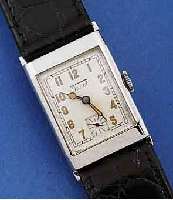 KONVOLUT: 2 HERRENARMBANDUHREN, UM 1938, 1X ROAMER SERIE STANDARD, METALL VERCHR., EDELST. -BOD. AUFGEDR., ORIG. BL. 2-FARB. VERSILB., ALTERSBED. ...