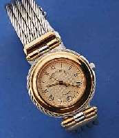 PHILIPPE CHARRIOL DAMENARMBANDUHR, SCHWEIZ UM 1990, GEH. AUßEN SOWIE 5-REIHIGES BD. AUS GEDREHTEM STAHL, LÜN. U. BANDANST. ROSE VERG., ...